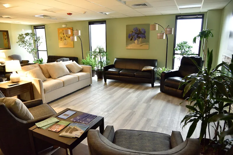 Bright and inviting shared living room at Lake Avenue Recovery Addiction Treatment Centers, a detox center in Boston.