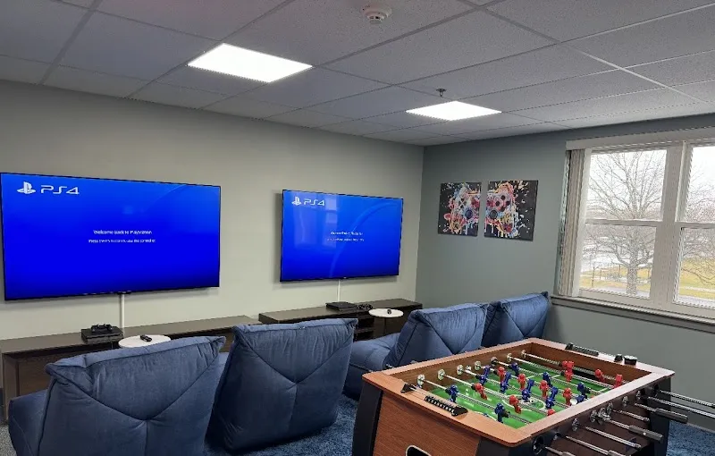 Game room with foosball table at Retreat of Boston - Drug & Alcohol Detox in Boston, MA, detox center in Boston.