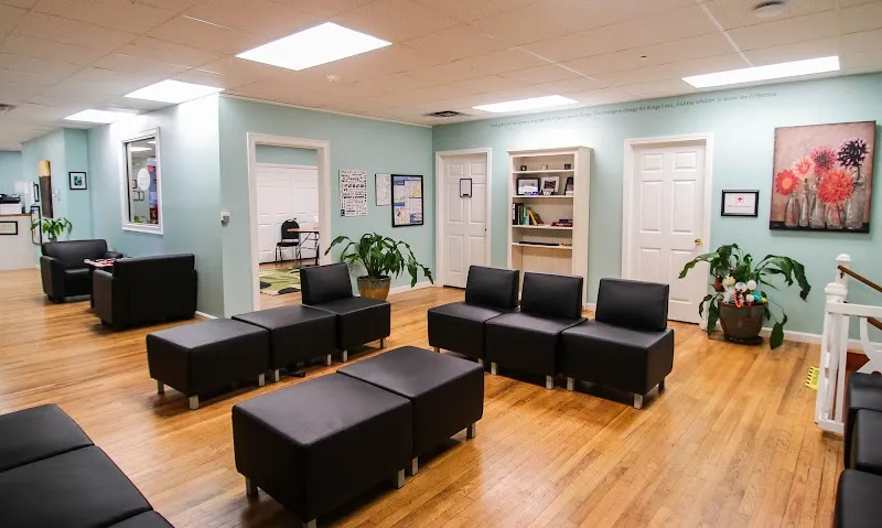 Spacious waiting area with modern seating at The Recovery Team - Cape Cod, a detox center in Boston.