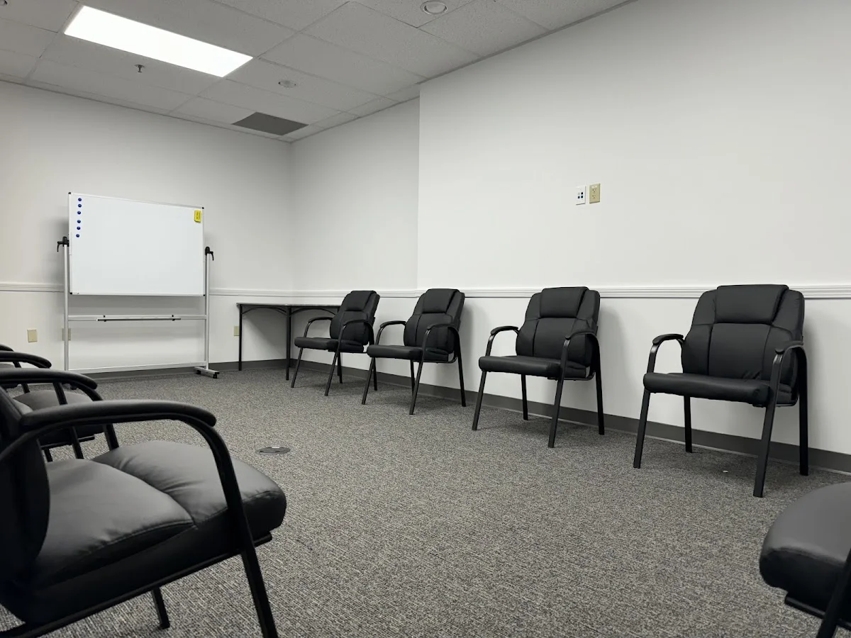 Empty chairs in a therapy room at Clover Behavioral Health, an intensive outpatient program in Boston.