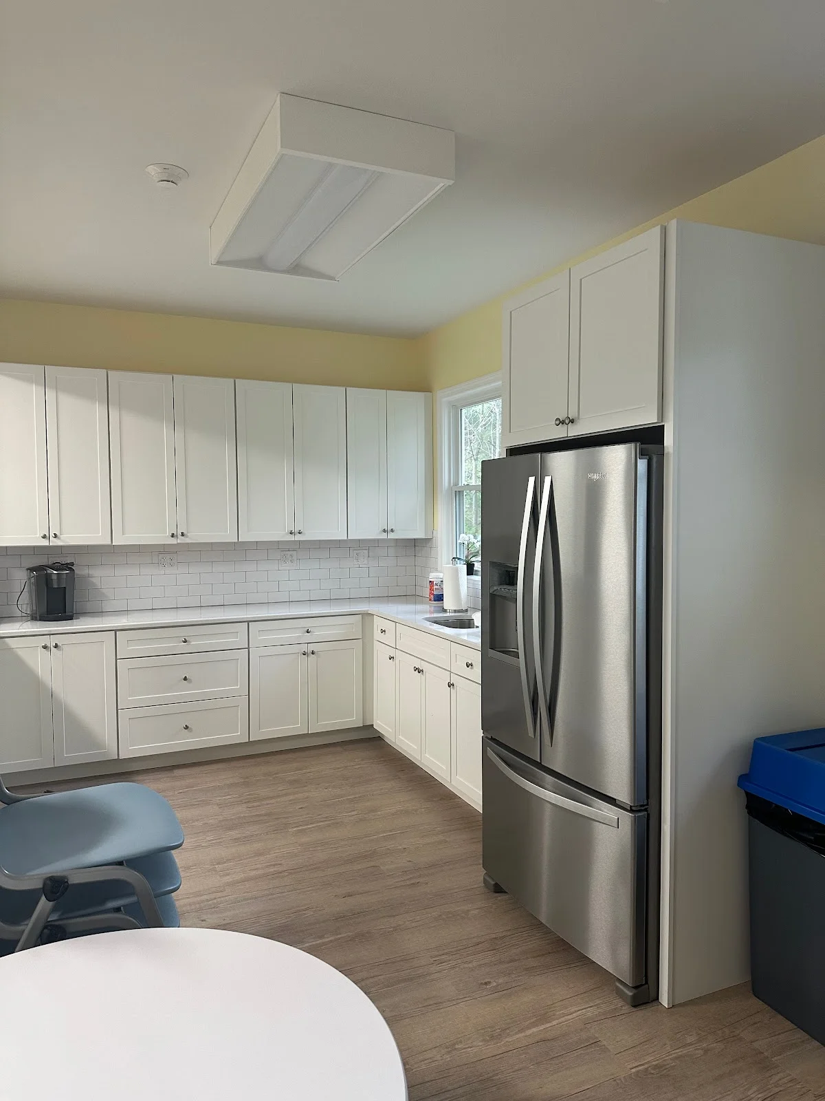Modern kitchen with stainless steel appliances at Rockland Recovery Behavioral Health, an intensive outpatient program in Boston.