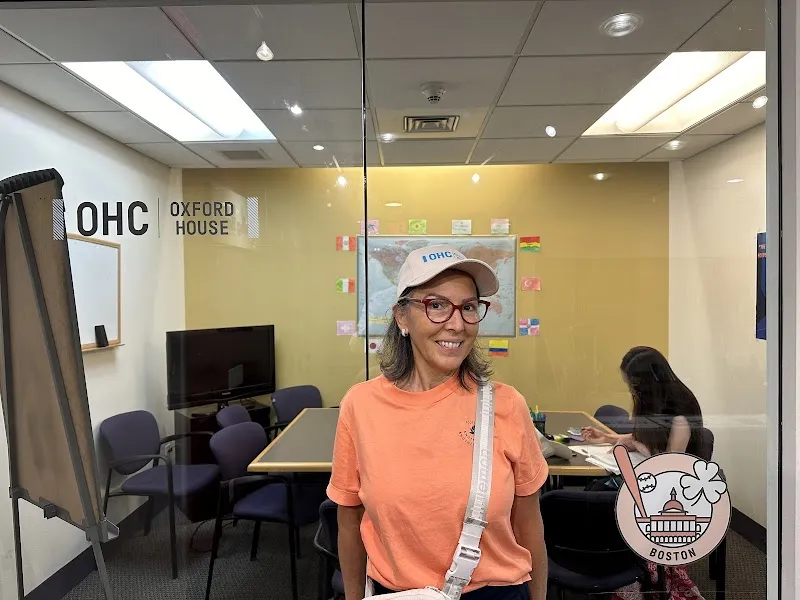 Bright meeting room with OHC Boston logo, a sober living home in Boston.