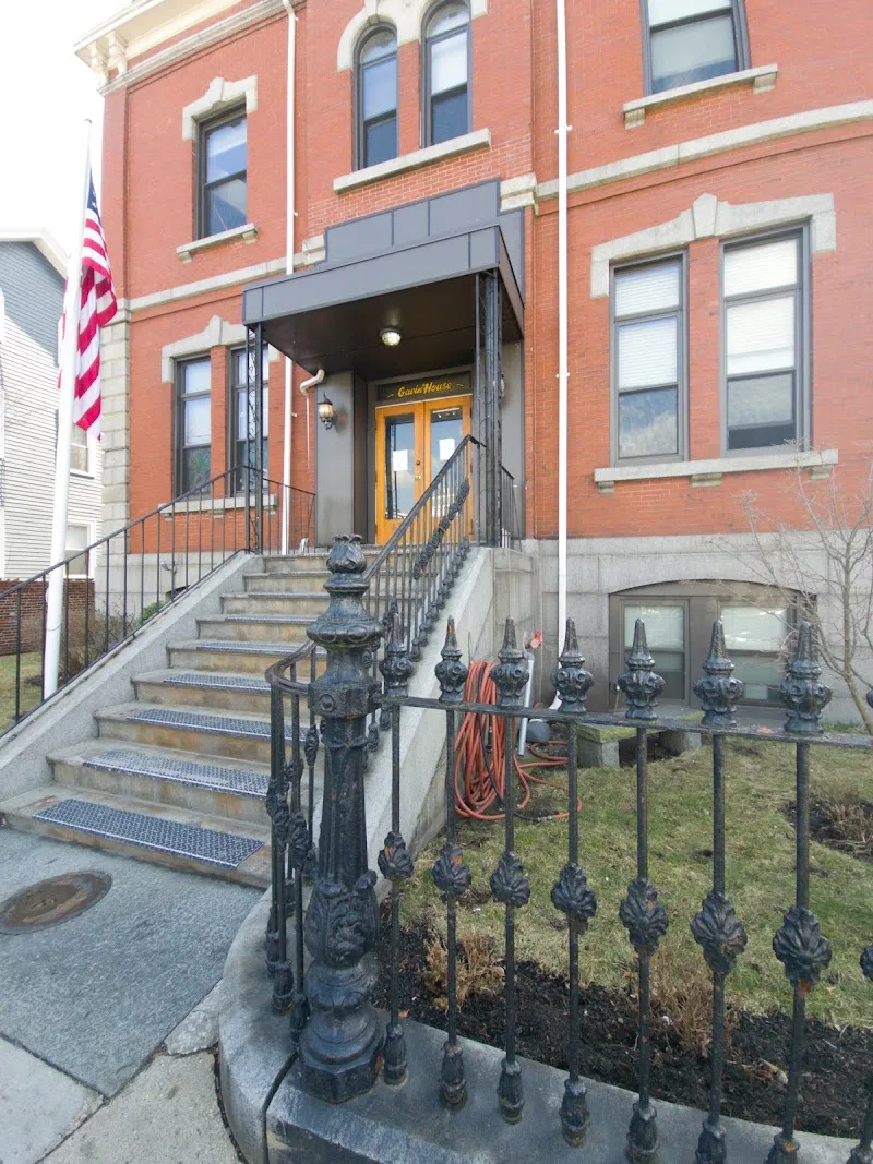 Inviting entrance with wrought iron railing at Gavin Foundation, a sober living home in Boston.
