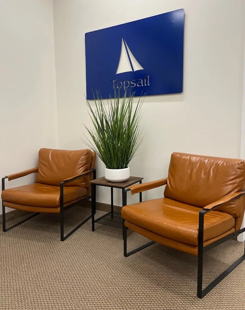 Cozy seating area with two chairs at Topsail Addiction Treatment Inc, a treatment center in Boston.